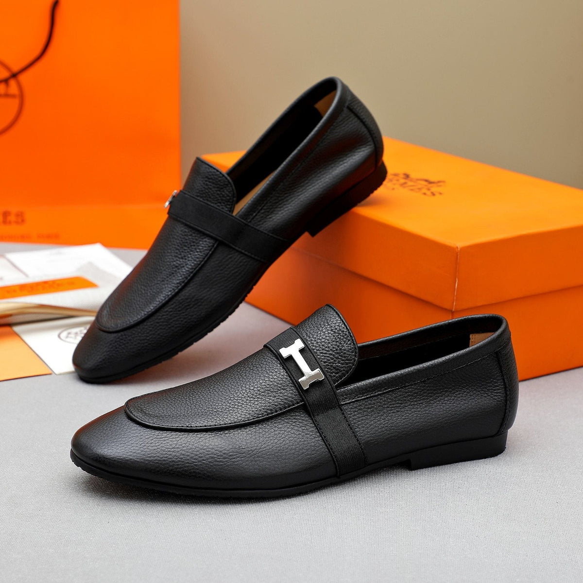 Hermès Black Pebbled Leather H-Hardware Loafers